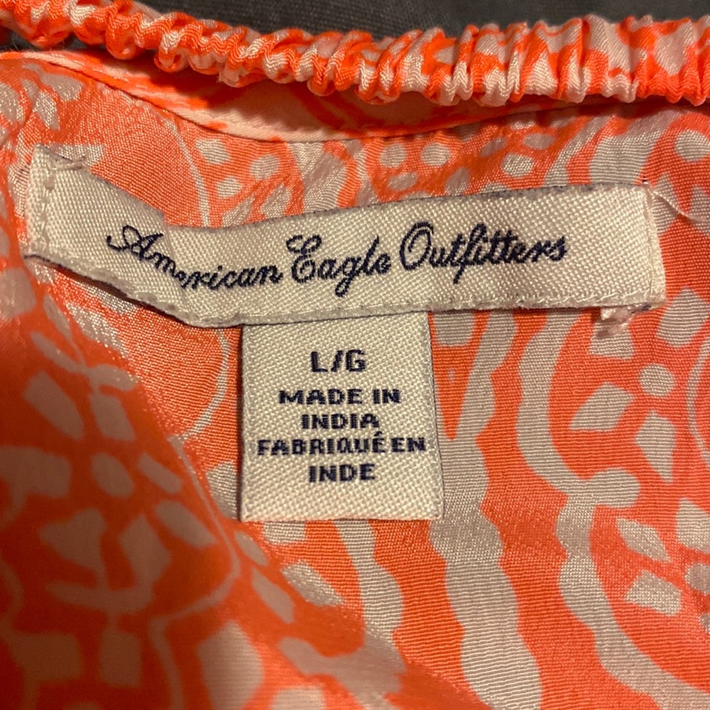 AE neon orange dress. Size large with four elastic stripes on back.